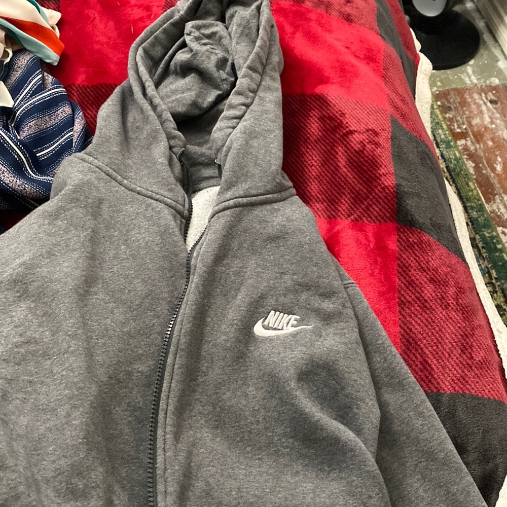 Grey Nike’s zip up hoodie size medium